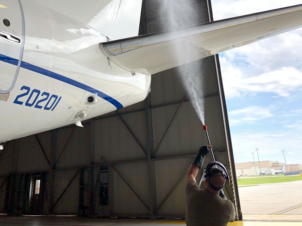 using wingman to spray under plane